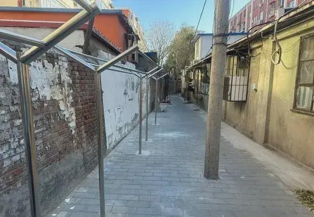 私搭乱建居民想提升小区环境的愿望实现了AG旗舰赞助马竞联赛拆除700平方米(图3)